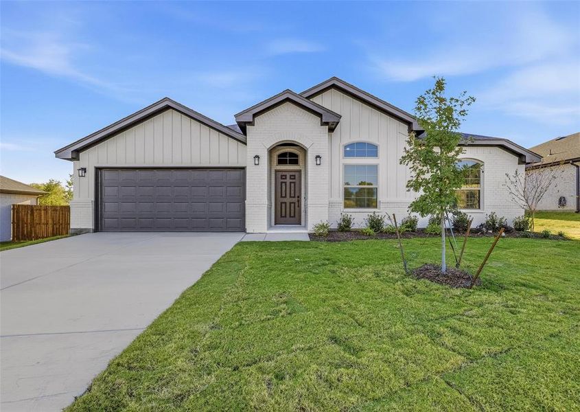 Front exterior of a new home in Stoneview, Glen Rose, TX, highlighting curb appeal (Image 2). Front exterior of a new home in Stoneview, Glen Rose, TX, highlighting curb appeal (Image 2).