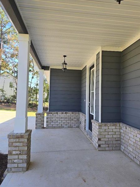Exterior details and patio area of a home in Waters Edge, Mansfield (Image 4).