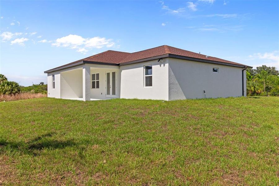 Exterior details and patio area of a home in , Port Charlotte (Image 27).