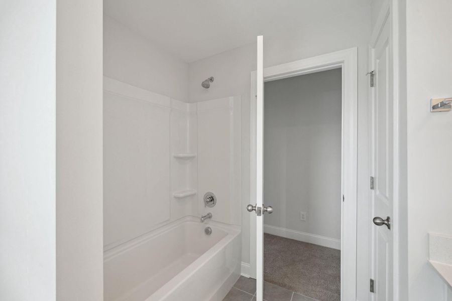 Furnished interior view inside a new home in Tidewater at Lakes of Cane Bay, Summerville (Image 15).