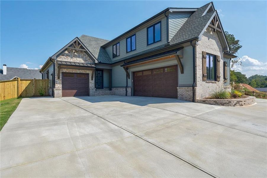 Front exterior of a new home in , Sugar Hill, GA, highlighting curb appeal (Image 35).