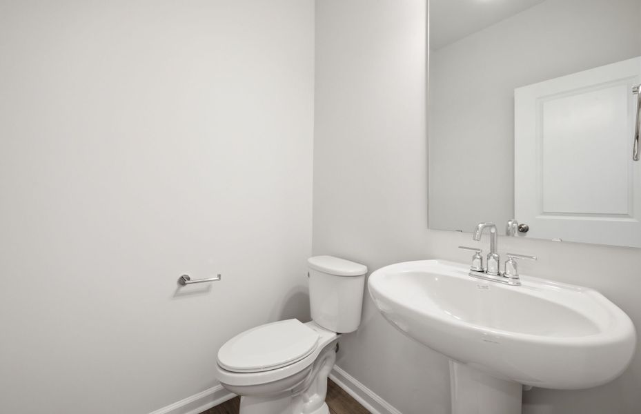 Furnished interior view inside a new home in Saunders Farm, Willow Spring (Image 11).