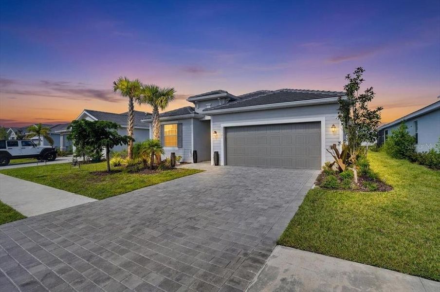 Front exterior of a new home in , Venice, FL, highlighting curb appeal (Image 2). Front exterior of a new home in , Venice, FL, highlighting curb appeal (Image 2).