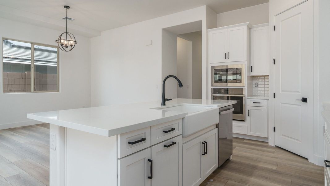 Representative furnished interior of a home built from the Pinehurst by William Ryan Homes in Fairways in Victory at Verrado, Buckeye (Image 14).
