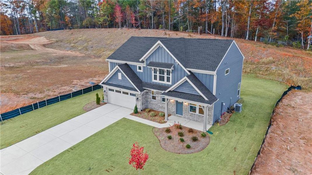 Front exterior of a new home in Pickens Bluff, Hiram, GA, highlighting curb appeal (Image 25).