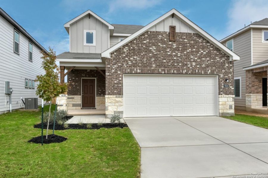 Front exterior of a new home in Meadows at Hennersby Hollow 40's, San Antonio, TX, highlighting curb appeal (Image 23).