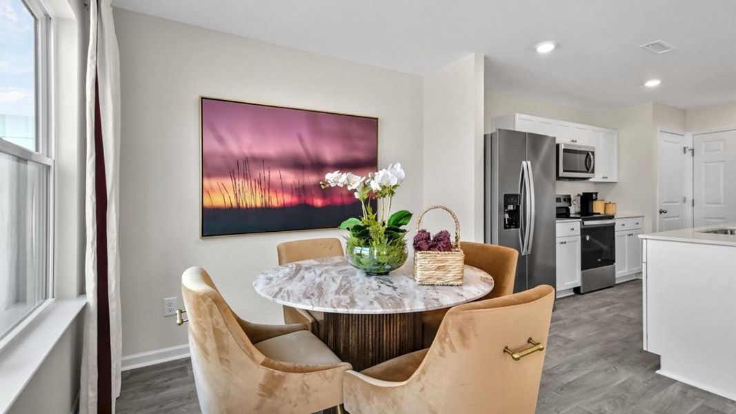 Furnished interior view inside a new home in North Village Townes, Greensboro (Image 11).