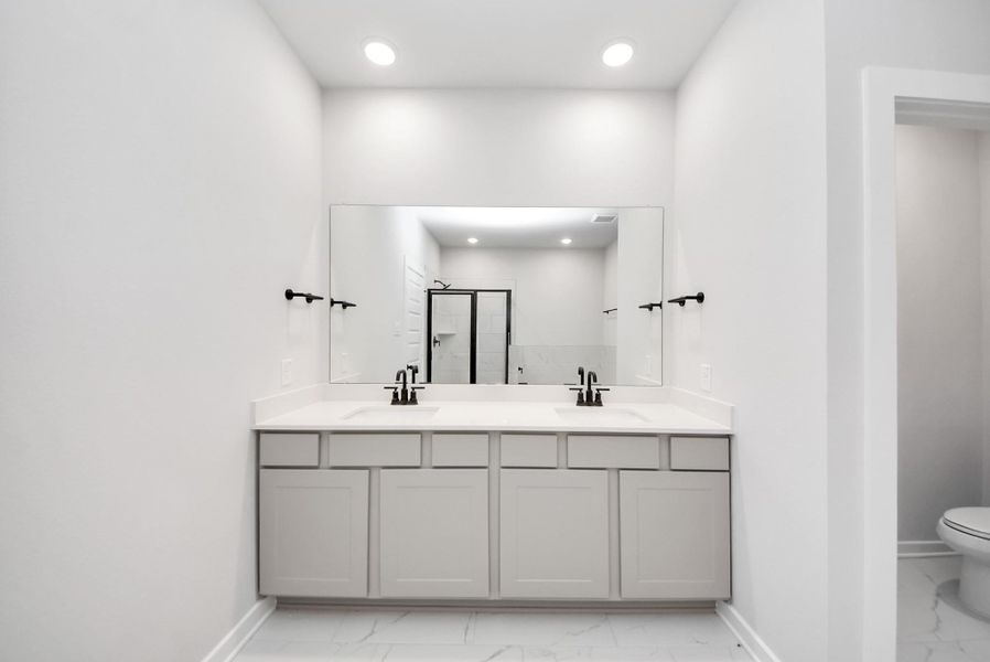 Furnished interior view inside a new home in Enclave at Newport, Crosby (Image 13).