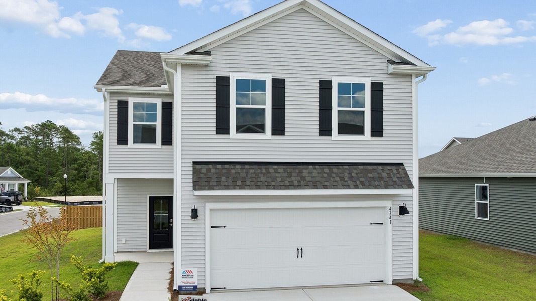 Front exterior of a new home in Bella Point, Bolivia, NC, highlighting curb appeal (Image 1). Front exterior of a new home in Bella Point, Bolivia, NC, highlighting curb appeal (Image 1).