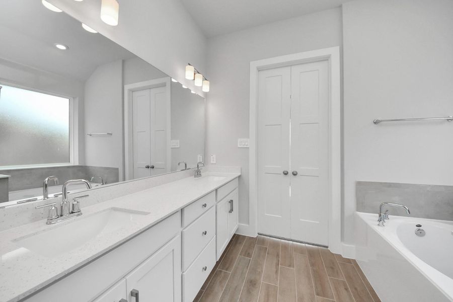 Furnished interior view inside a new home in Amira: Premier Collection, Tomball (Image 9).