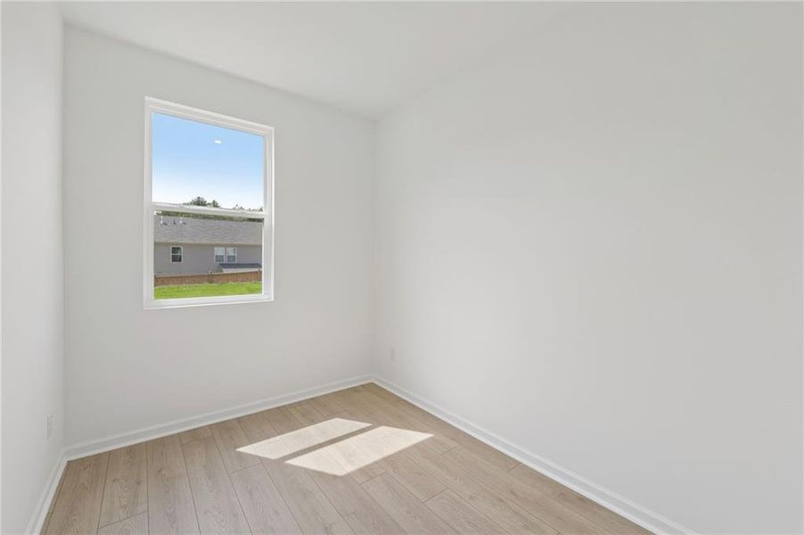Spacious, unfurnished interior of a new home in Windance Lake, Loganville (Image 36).