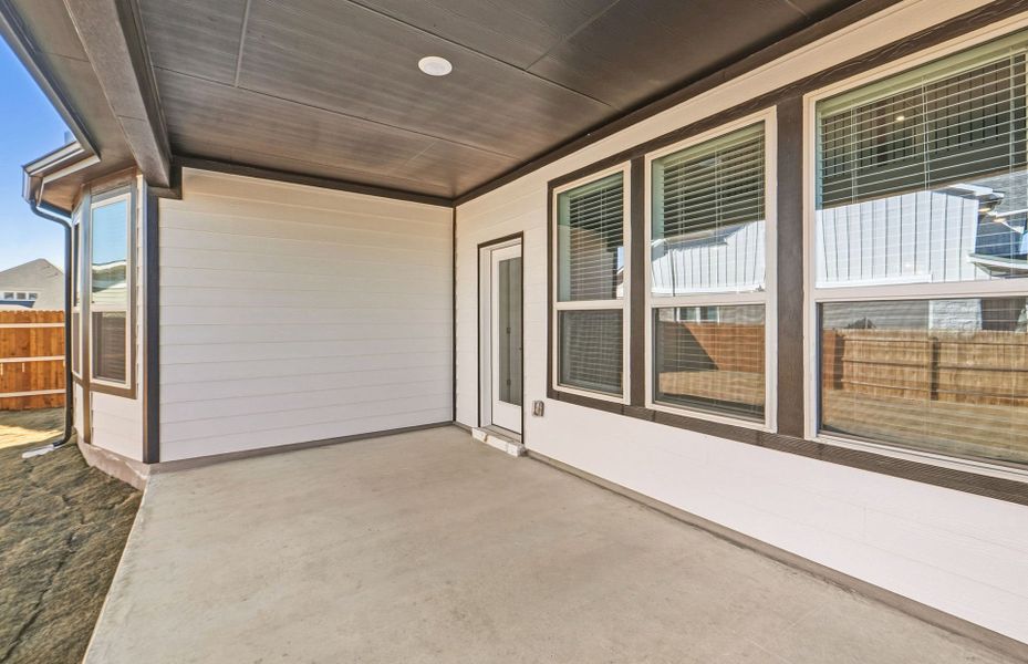 Exterior details and patio area of a home in Santa Rita Ranch, Liberty Hill (Image 30).