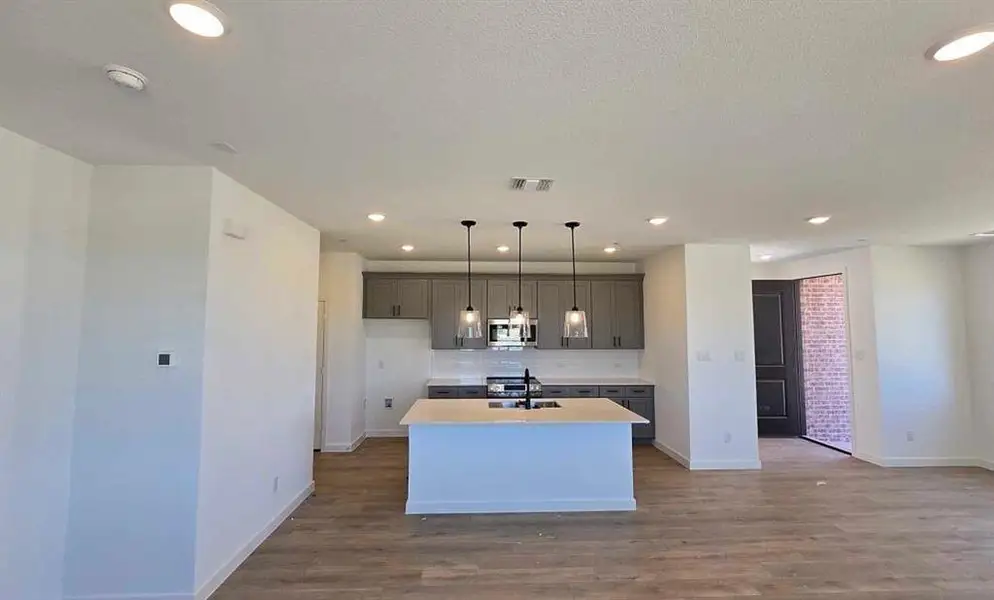 Open Kitchen-Dining Room Construction Progress featuring the Minimalist Collection