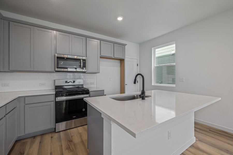 Furnished interior view inside a new home in Painted Prairie, Aurora (Image 11).