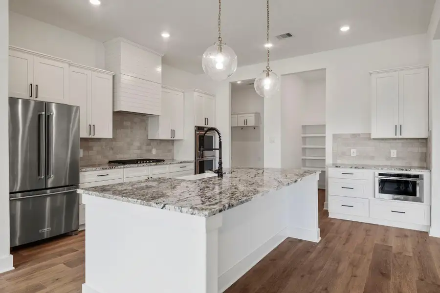 Furnished interior view inside a new home in Magnolia Woods - 70', Magnolia (Image 5).