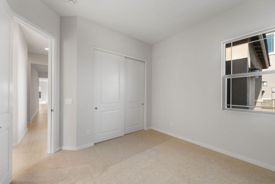 Spacious, unfurnished interior of a new home in Legado West, Queen Creek (Image 29).