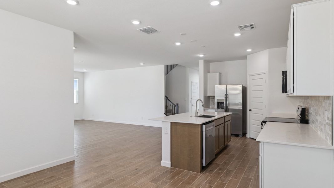 Representative furnished interior of a home built from the Crow by D.R. Horton in Zanjero Pass, Glendale (Image 17).