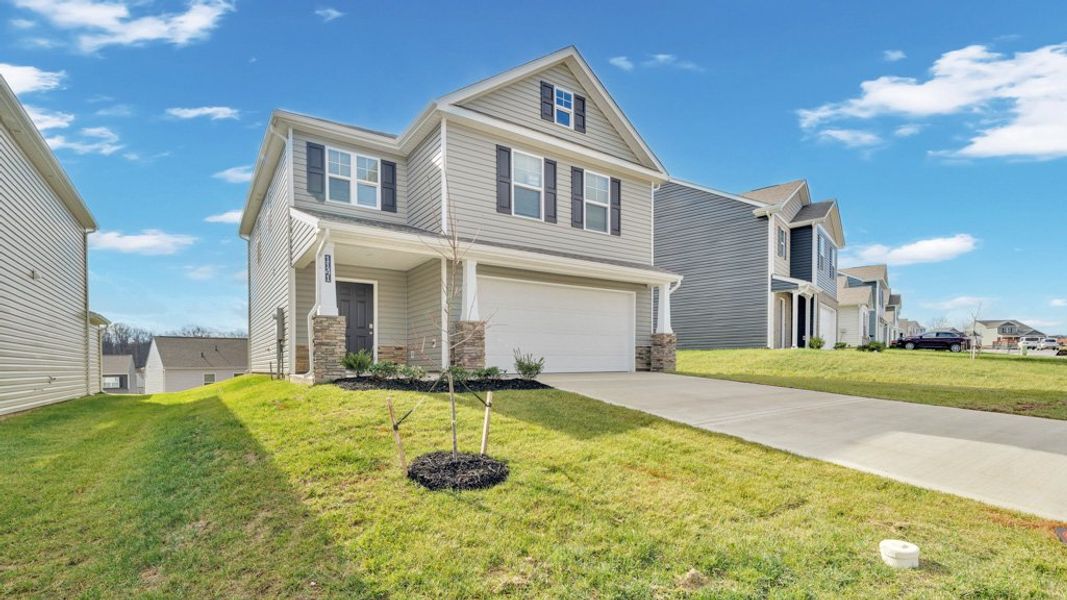 Front exterior of a new home in Johnson Farms, Greeneville, TN, highlighting curb appeal (Image 2).