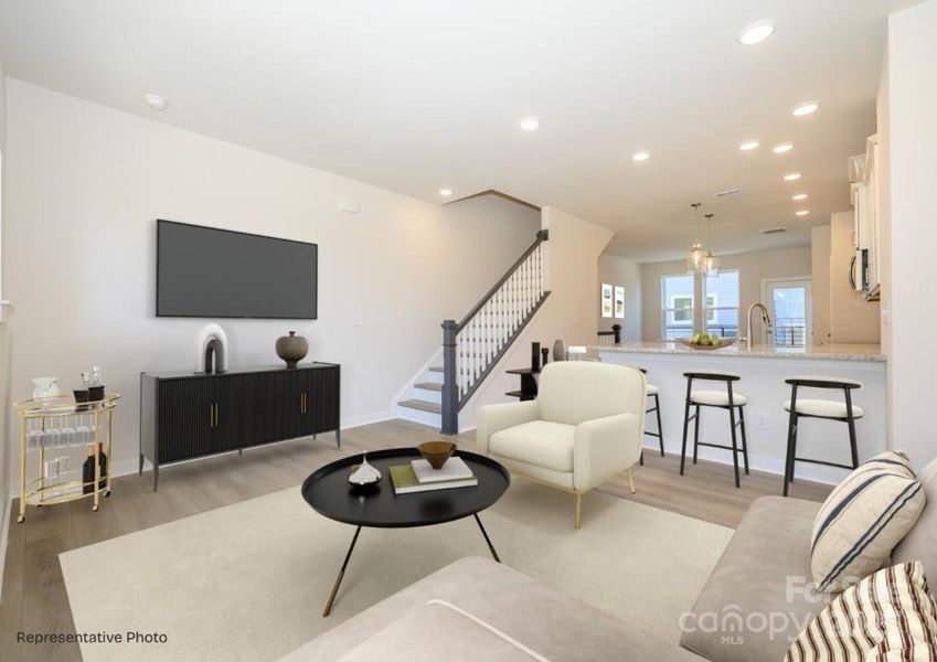 Furnished interior view inside a new home in Central Living at Craig, Charlotte (Image 2).
