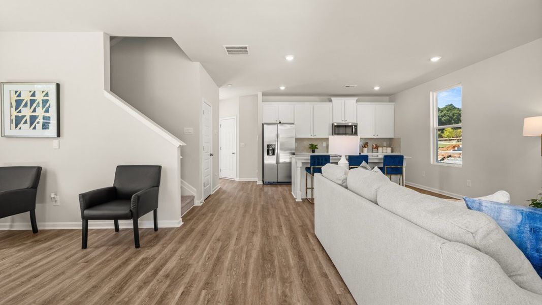 Representative furnished interior of a home built from the Iria Glen by D.R. Horton in Brookland Commons, Monroe (Image 6).
