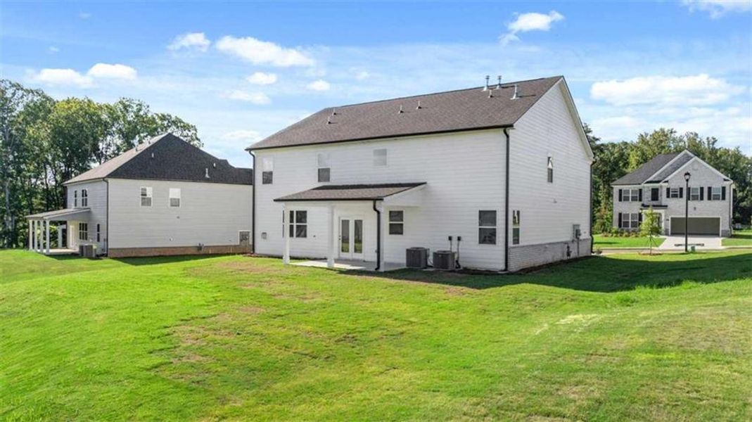 Exterior details and patio area of a home in Independence, Loganville (Image 23).