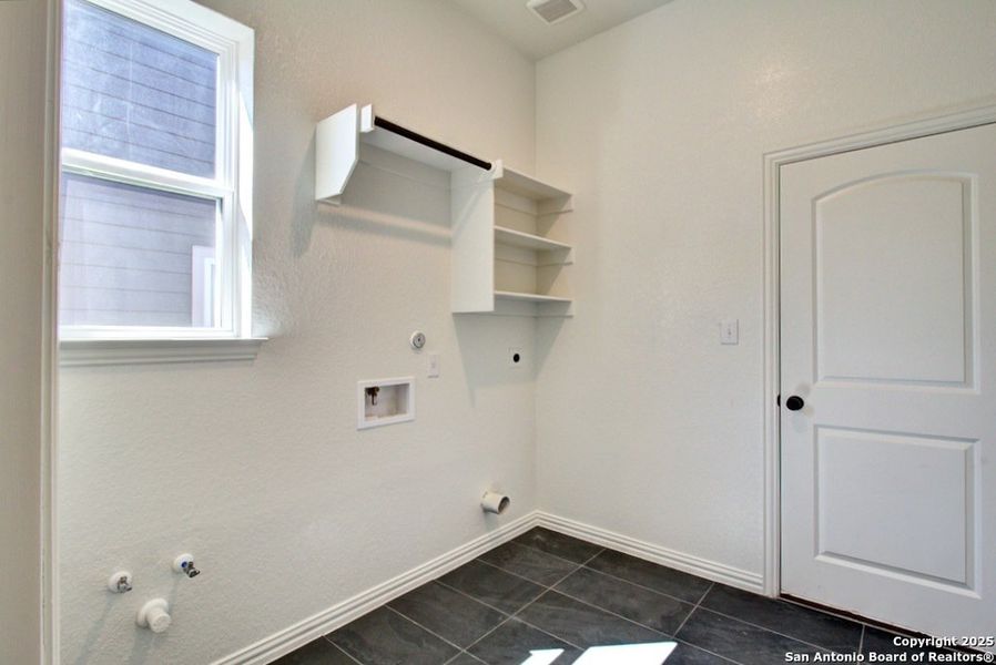 Furnished interior view inside a new home in Casinas at Gruene, New Braunfels (Image 3).