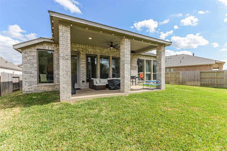 Exterior details and patio area of a home in Escondido, Magnolia (Image 24).