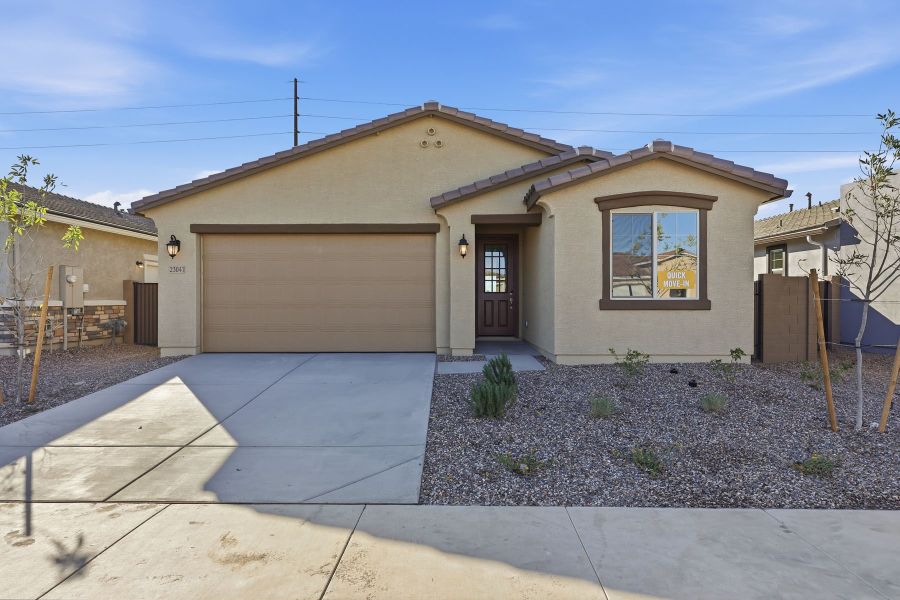 Front exterior of a new home in Empire Pointe, Queen Creek, AZ, highlighting curb appeal (Image 1). Front exterior of a new home in Empire Pointe, Queen Creek, AZ, highlighting curb appeal (Image 1).