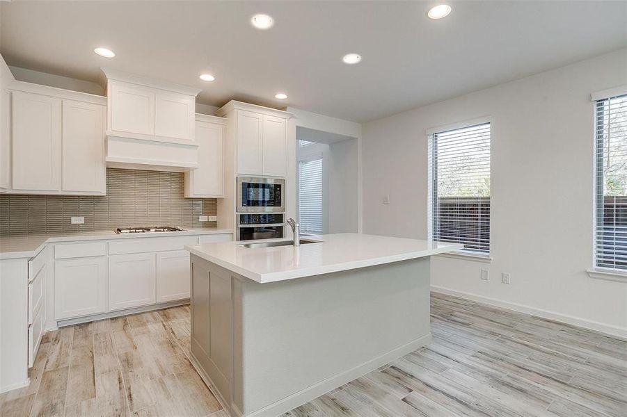 Furnished interior view inside a new home in Prairie Oaks, Oak Point (Image 5).