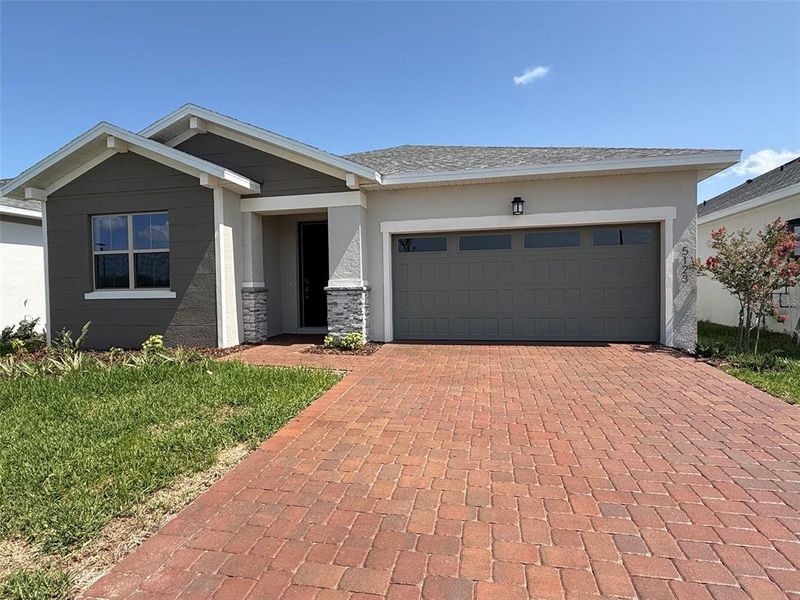 Front exterior of a new home in , St. Cloud, FL, highlighting curb appeal (Image 1). Front exterior of a new home in , St. Cloud, FL, highlighting curb appeal (Image 1).