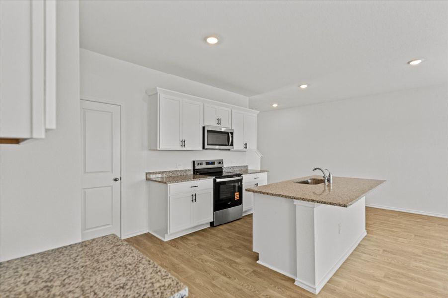 Furnished interior view inside a new home in Palomino, Manor (Image 8).