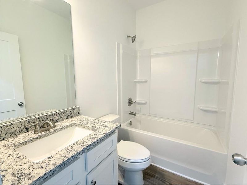 Furnished interior view inside a new home in Westlyn, Winder (Image 4).