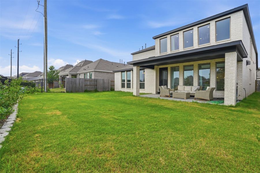 Exterior details and patio area of a home in Elyson, Katy (Image 4).