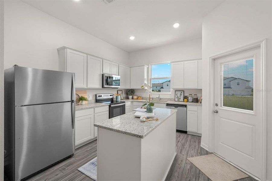 Furnished interior view inside a new home in Sol Vista, Dundee (Image 9).