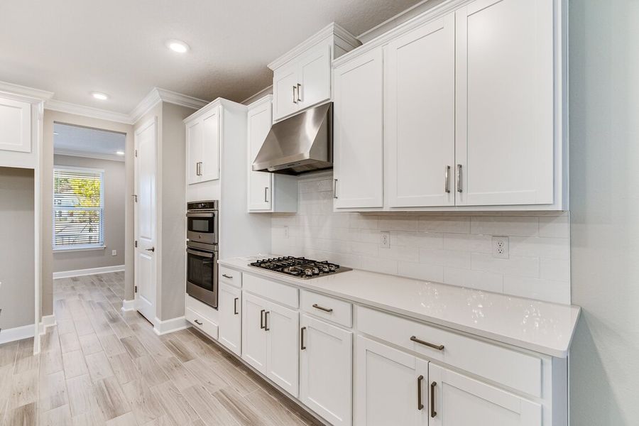 Furnished interior in a model home at Osprey Cove in St. Marys (Image 18).