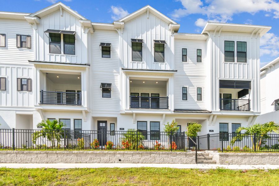 Exterior details and patio area of a home in Emerald Landing at Waterside at Lakewood Ranch – City Homes, Sarasota (Image 23).