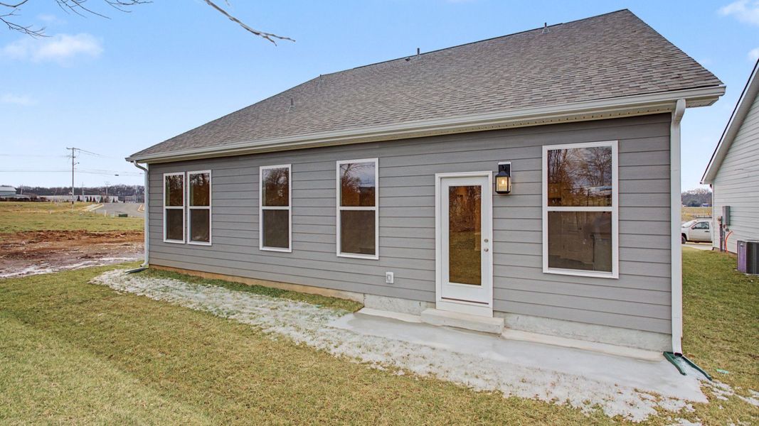 Exterior details and patio area of a home in Cottages of Bearwood, Mount Pleasant (Image 3). Exterior details and patio area of a home in Cottages of Bearwood, Mount Pleasant (Image 3).