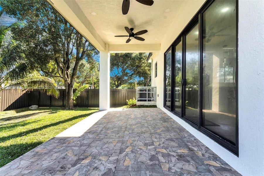 Exterior details and patio area of a home in , North Miami (Image 27).