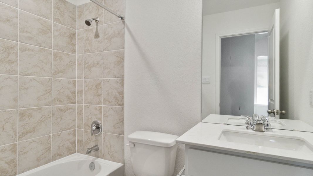 Representative furnished interior of a home built from the T30A Atlanta by D.R. Horton in Riverfield, Josephine (Image 11).