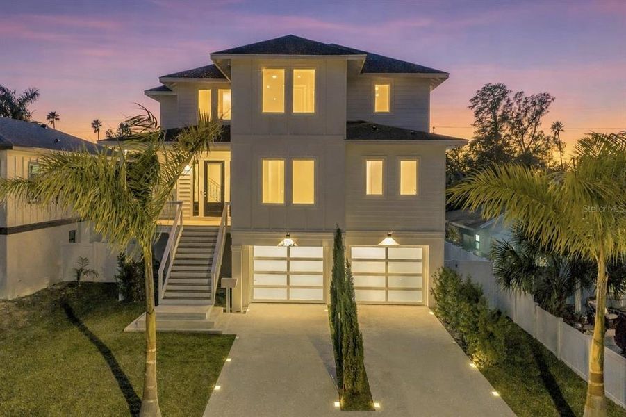 Front exterior of a new home in , St. Petersburg, FL, highlighting curb appeal (Image 30).