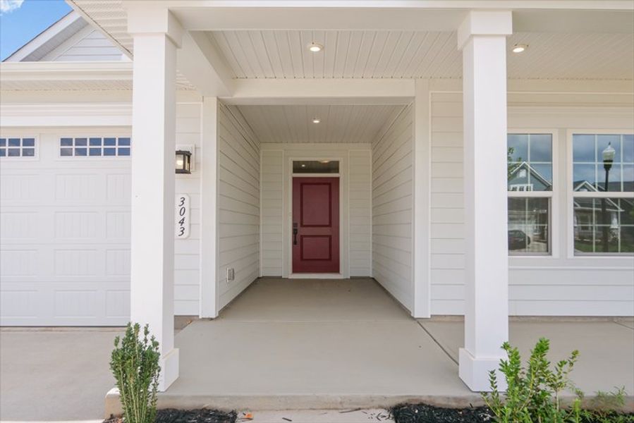Exterior details and patio area of a home in Berkeley, Spartanburg (Image 17).
