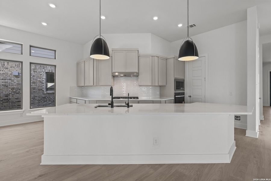 Furnished interior view inside a new home in Nopal Valley, San Antonio (Image 12).