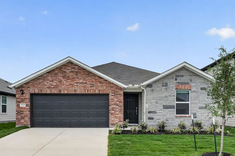 Representative exterior photo of a completed home built from the Finch by Taylor Morrison in Longview, Del Valle, TX (Image 12). Representative exterior photo of a completed home built from the Finch by Taylor Morrison in Longview, Del Valle, TX (Image 12).