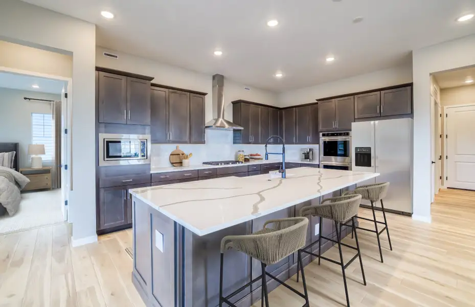 Furnished interior view inside a new home in Hilltop at Inspiration, Aurora (Image 7). Furnished interior view inside a new home in Hilltop at Inspiration, Aurora (Image 7).