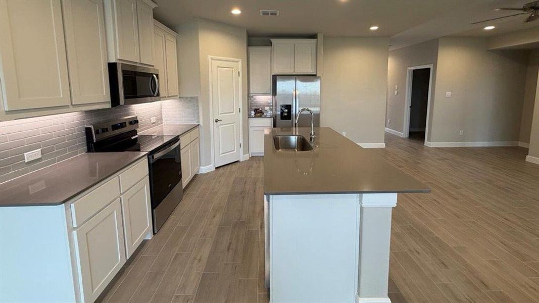 Kitchen - All Home and community information, including pricing, included features, terms, availability and amenities, are subject to change at any time without notice or obligation. All Drawings, pictures, photographs, video, square footages, floor plans, elevations, features, colors and sizes are approximate for illustration purposes only and will vary from the homes as built.