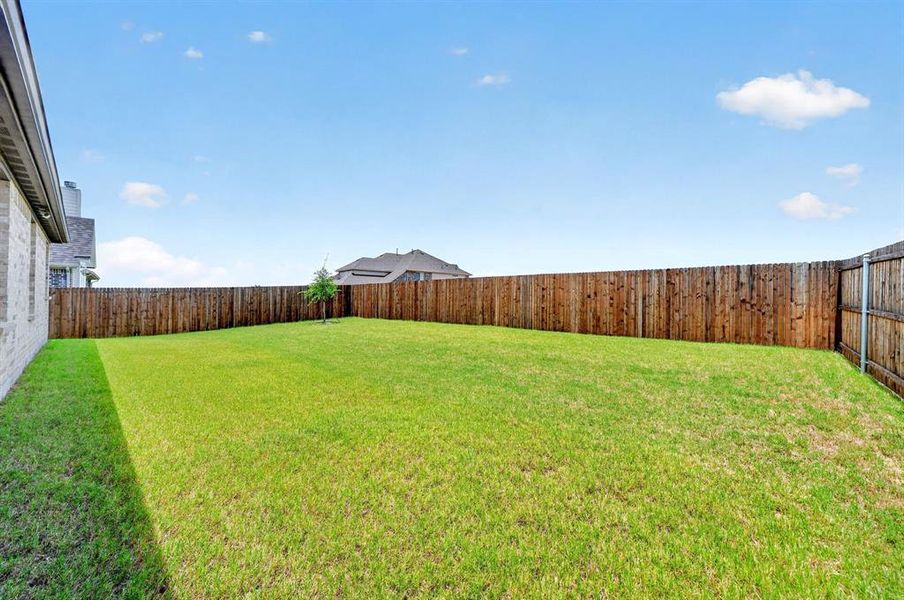 Exterior details and patio area of a home in Stone River Glen, Royse City (Image 3). Exterior details and patio area of a home in Stone River Glen, Royse City (Image 3).