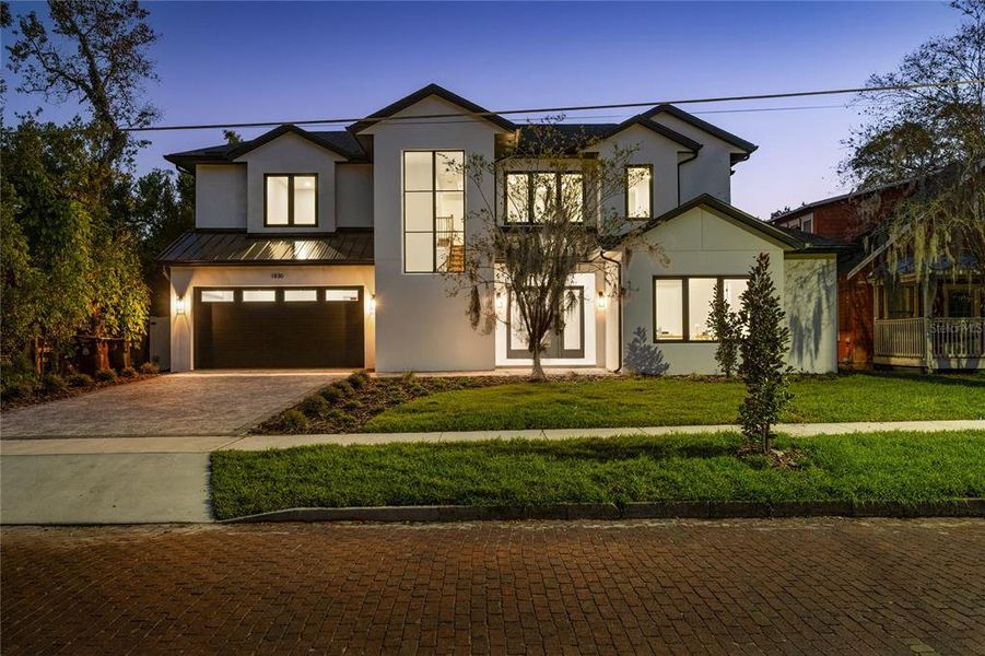 Front exterior of a new home in , Orlando, FL, highlighting curb appeal (Image 25). Front exterior of a new home in , Orlando, FL, highlighting curb appeal (Image 25).