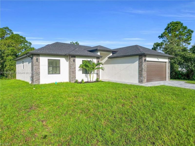 Exterior details and patio area of a home in , Lehigh Acres (Image 22). Exterior details and patio area of a home in , Lehigh Acres (Image 22).