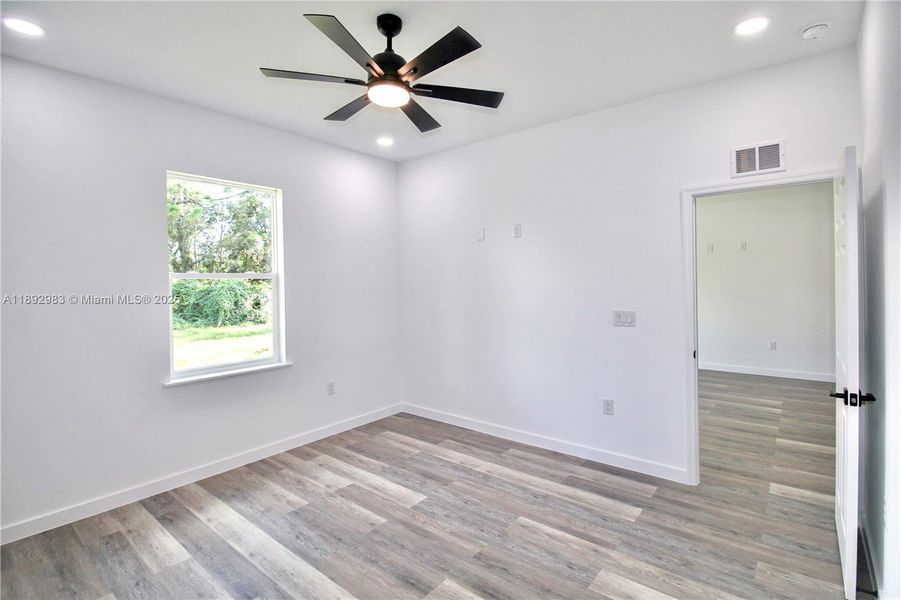 Spacious, unfurnished interior of a new home in , Lake Placid (Image 24).