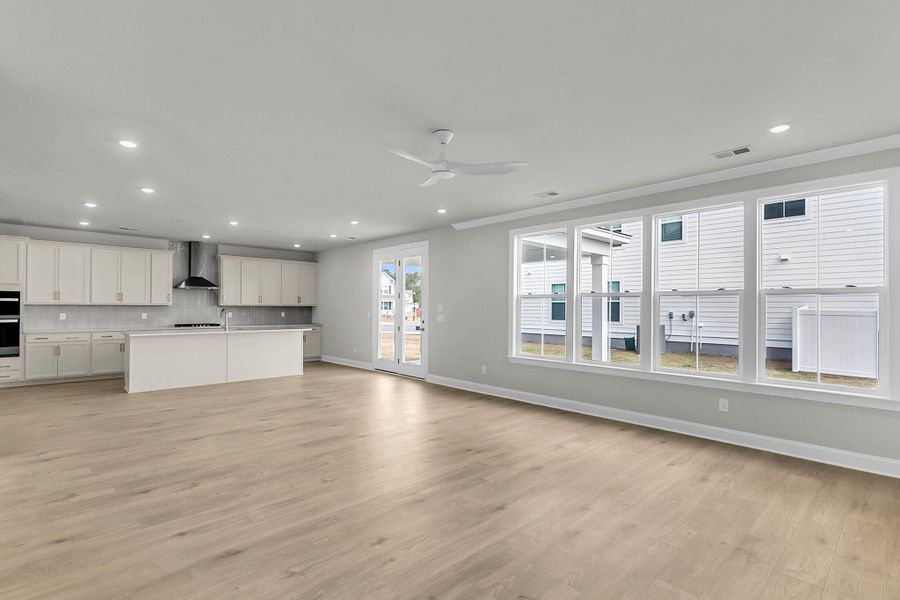 Spacious, unfurnished interior of a new home in Tidewater at Lakes of Cane Bay, Summerville (Image 42).